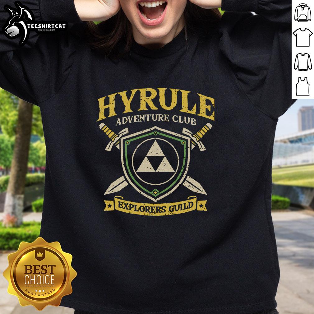 Cozy Pretty Hyrule Adventure Club sweatshirt displayed on a wooden background, perfect for gaming fans and cozy attire.