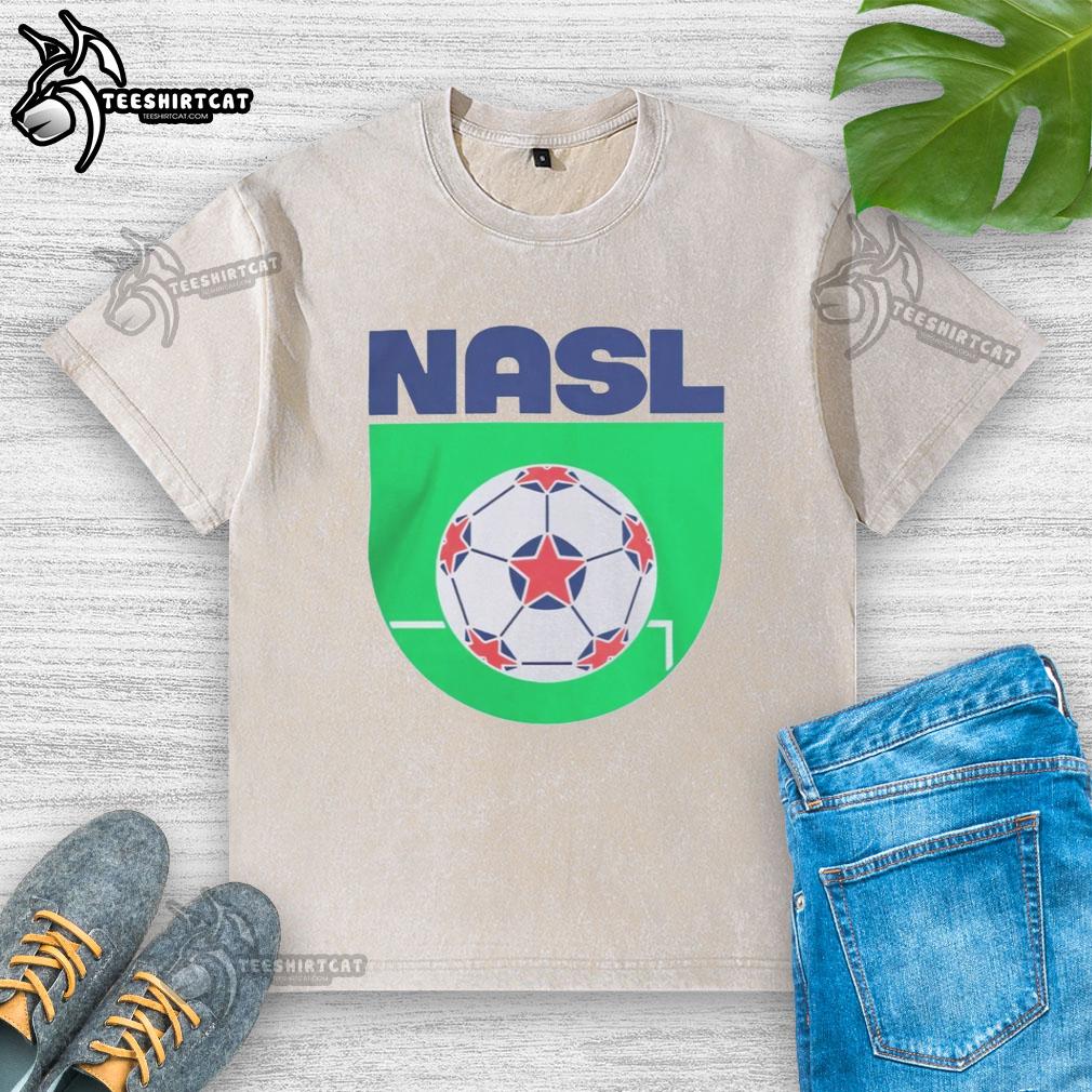 Pretty North American Soccer League logo printed on a stylish washed t-shirt for soccer fans.