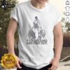 Alt Text: Pretty girl in a balaclava mask walking two dogs while wearing a Fuck Around And Find Out T-shirt.