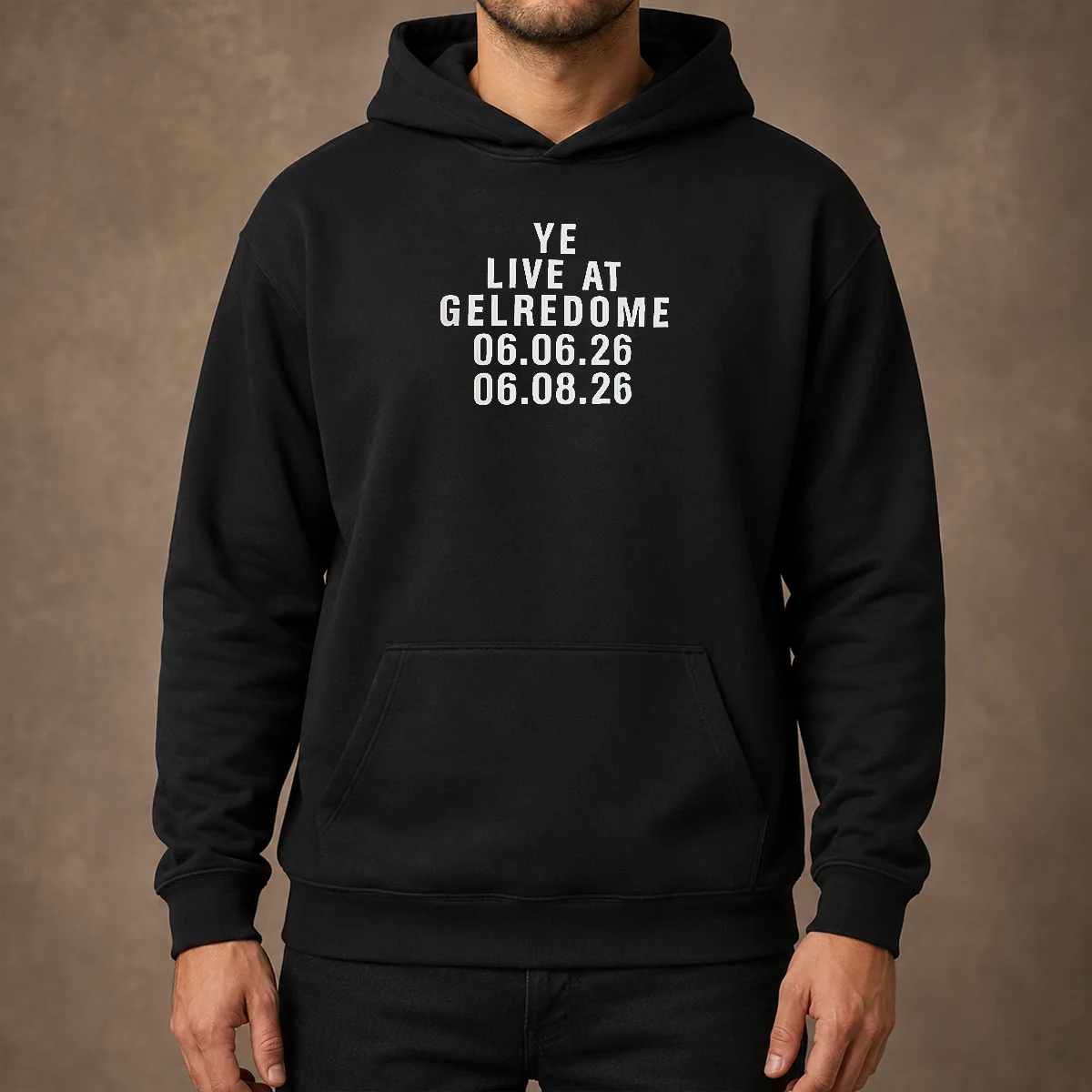 Top Kanye West Ye Live At Gelredome 06 06 26 06 08 26 Hoodie in black, front view with drawstring hood and kangaroo pocket