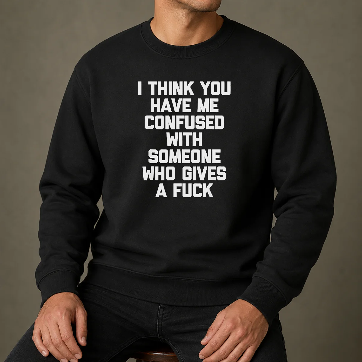 Good I Think You Have Me Confused With Someone WHO Gives A Fuck Sweater in dark gray with bold white text, crewneck style