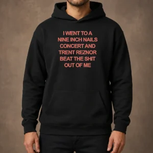 Nice I Went To A Nine Inch Nails Concert And Trent Reznor Beat The Shit Out Of Me Hoodie in black, front view with drawstring hood and kangaroo pocket